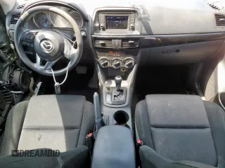 2013 Mazda CX-5 Sport with VIN JM3KE2BE5D0129797, listed as a Copart auction lot 58051185 with 200,712 mi miles and Salvage title. Bid and sale history available at DreamBid. Image 8.
