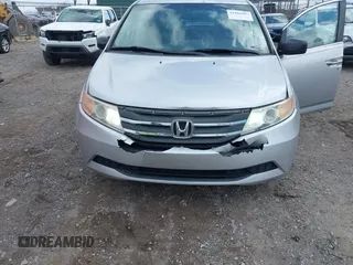 2011 Honda Odyssey EX-L with VIN 5FNRL5H60BB012206, listed as a IAAI auction lot 41982987 with 220,913 mi miles and . Bid and sale history available at carsss.com. Image 6.