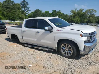 2019 Chevrolet Silverado 1500 LTZ with VIN 3GCUYGED5KG125542, listed as a Copart auction lot 53467455 with 92,053 mi miles and Salvage Title. Bid and sale history available at DreamBid. Image 4.