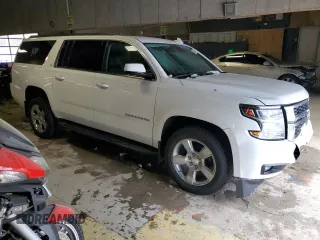 2020 Chevrolet Suburban LT with VIN 1GNSKHKC2LR187449, listed as a Copart auction lot 45943195 with 100,559 mi miles and Salvage Title. Bid and sale history available at carsss.com. Image 4.