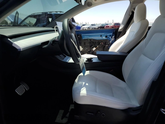 2021 Tesla Model Y Performance z VIN 5YJYGDEF0MF157795, wystawiony jako Copart lot #57163245 z przebiegiem 62 598 mil mil oraz Szkoda całkowita • Salvage title. Historia ofert i sprzedaży dostępna na DreamBid. Obrazek 7.