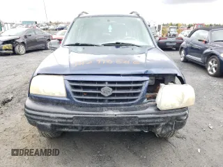 2004 Suzuki Vitara z VIN 2S3TD62VX46100019, wystawiony jako Copart lot #74291684 z przebiegiem 148 566 mil mil oraz Szkody całkowita. Historia ofert i sprzedaży dostępna na DreamBid. Obrazek 5.