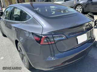 2018 Tesla Model 3 Long Range Battery with VIN 5YJ3E1EA8JF026497, listed as a IAAI auction lot 41987950 with 72,373 mi miles. Bid and sale history available at carsss.com. Image 3.