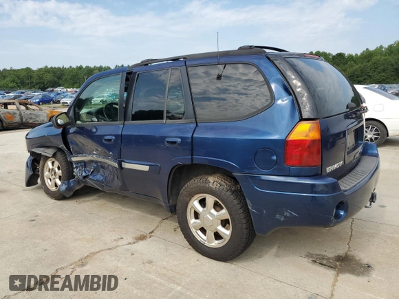 2002 GMC Envoy SLE with VIN 1GKDS13SX22484740, listed as a Copart auction lot 67443284 with 209,933 mi miles and Salvage Title. Bid and sale history available at carsss.com. Image 2.
