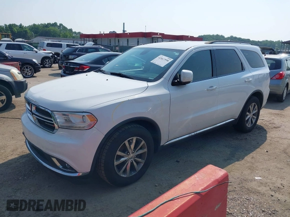 2015 Dodge Durango Limited with VIN 1C4RDHDGXFC789038, listed as a IAAI auction lot 42467998 with 122,932 mi miles and . Bid and sale history available at DreamBid. Image 2.