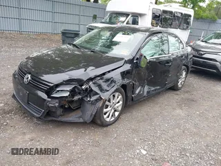 2013 Volkswagen Jetta SE with VIN 3VWDP7AJ7DM212911, listed as a IAAI auction lot 42307323 with 128,745 mi miles and . Bid and sale history available at DreamBid. Image 2.