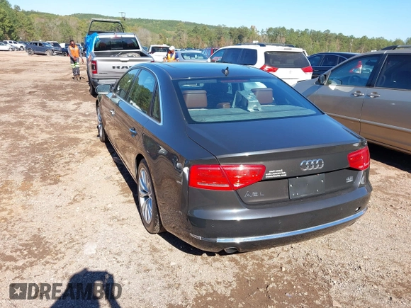 2011 Audi A8 with VIN WAURVAFDXBN014290, listed as a IAAI auction lot 40860777 with 152,584 mi miles and . Bid and sale history available at DreamBid. Image 3.