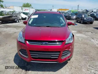 2016 Ford Escape SE z VIN 1FMCU9GX1GUC04815, wystawiony jako IAAI lot #42235499 z przebiegiem 84 713 mil mil oraz . Historia ofert i sprzedaży dostępna na DreamBid. Obrazek 12.