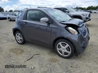 2012 Scion iQ z VIN JTNJJXB06CJ009187, wystawiony jako Copart lot #56563665 z przebiegiem 105 014 mil mil oraz Szkoda całkowita • Salvage title. Historia ofert i sprzedaży dostępna na DreamBid. Obrazek 4.