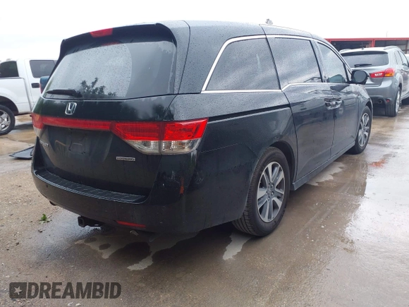 2016 Honda Odyssey Touring Elite with VIN 5FNRL5H93GB056038, listed as a IAAI auction lot 42185405 with Not Provided miles. Bid and sale history available at carsss.com. Image 4.