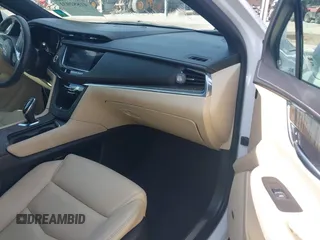2017 Cadillac XT5 FWD with VIN 1GYKNARS0HZ107734, listed as a IAAI auction lot 41882031 with 89,397 mi miles. Bid and sale history available at carsss.com. Image 5.