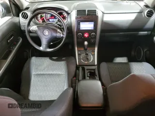2013 Suzuki Grand Vitara Premium z VIN JS3TE0D60D4100323, wystawiony jako Copart lot #59333335 z przebiegiem 102 368 mil mil oraz Szkoda całkowita • Salvage title. Historia ofert i sprzedaży dostępna na DreamBid. Obrazek 8.