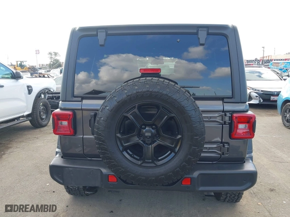 2020 Jeep Wrangler Unlimited Sport Altitude with VIN 1C4HJXDN4LW345855, listed as a IAAI auction lot 41550171 with 27,995 mi miles. Bid and sale history available at carsss.com. Image 17.