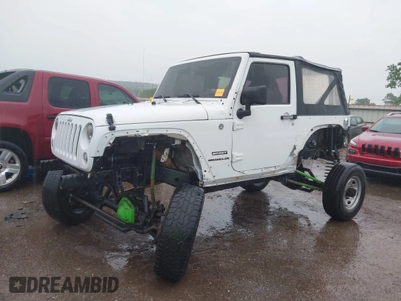2013 Jeep Wrangler Sport with VIN 1C4AJWAG8DL601399, listed as a IAAI auction lot 42186399 with 130,195 mi miles and . Bid and sale history available at DreamBid. Image 2.