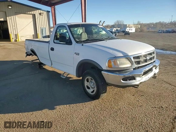 1997 Ford F-150 z VIN 1FTDF18W4VKD41606, wystawiony jako Copart lot #83808524 z przebiegiem 173 675 mil mil oraz Czysty tytuł • Clean title. Historia ofert i sprzedaży dostępna na DreamBid. Obrazek 11.