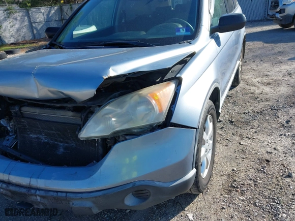 2007 Honda CR-V EX with VIN JHLRE48577C024338, listed as a IAAI auction lot 42068770 with 197,943 mi miles. Bid and sale history available at carsss.com. Image 14.