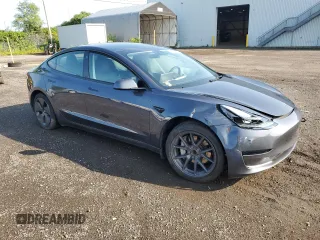2023 Tesla Model 3 with VIN 5YJ3E1EA8PF692428, listed as a Copart auction lot 64667414 with 16,704 mi miles and Salvage Title. Bid and sale history available at DreamBid. Image 4.
