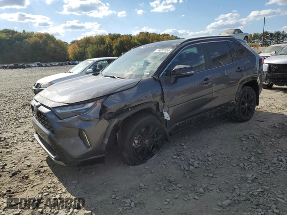 2023 Toyota RAV4 Hybrid XSE with VIN 4T3E6RFV1PU112579, listed as a Copart auction lot 74387924 with 103,340 mi miles and Salvage title. Bid and sale history available at DreamBid. Image 1.