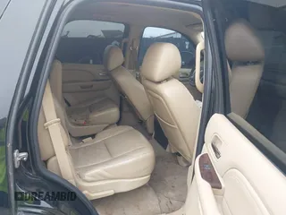 2010 Cadillac Escalade z VIN 1GYUCAEF1AR264105, wystawiony jako IAAI lot #41882488 z przebiegiem 190 113 mil mil oraz . Historia ofert i sprzedaży dostępna na DreamBid. Obrazek 8.