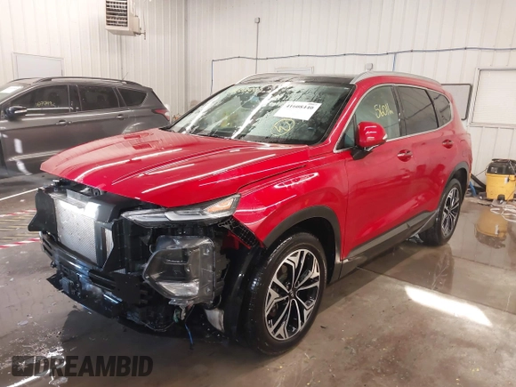 2020 Hyundai Santa Fe Limited with VIN 5NMS53AA0LH293308, listed as a IAAI auction lot 41608440 with 56,011 mi miles and . Bid and sale history available at DreamBid. Image 18.