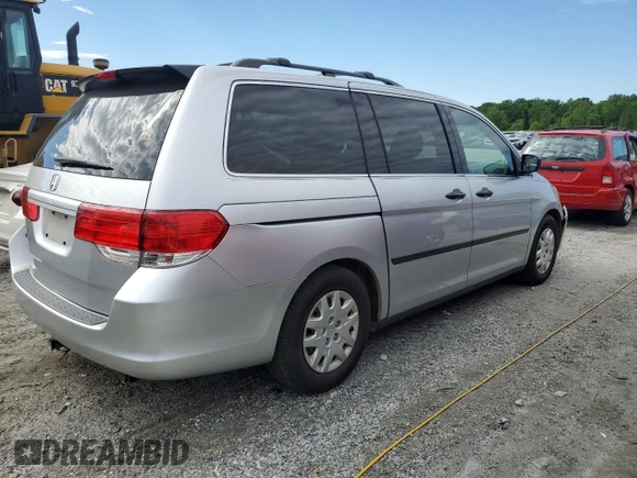 2010 Honda Odyssey LX with VIN 5FNRL3H25AB027316, listed as a Copart auction lot 57937805 with 181,551 mi miles and Salvage title. Bid and sale history available at DreamBid. Image 3.