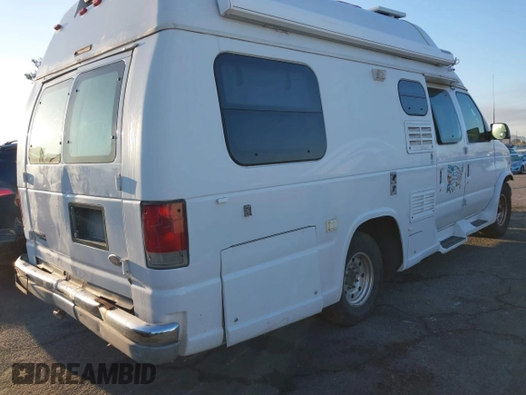 2002 Ford Econoline Cargo z VIN 1FDSE34L72HB41096, wystawiony jako IAAI lot #37394945 z przebiegiem 241 707 mil mil oraz . Historia ofert i sprzedaży dostępna na DreamBid. Obrazek 4.