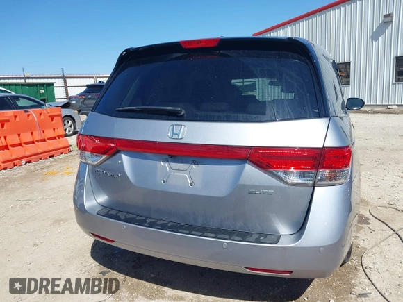 2016 Honda Odyssey Touring Elite with VIN 5FNRL5H96GB090653, listed as a IAAI auction lot 41720195 with 68,969 mi miles. Bid and sale history available at carsss.com. Image 16.