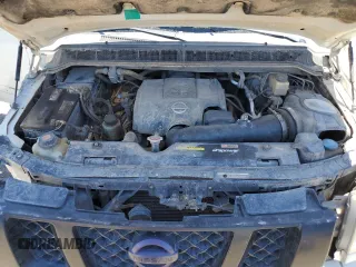 2015 Nissan Titan Pro-4X z VIN 1N6AA0EC9FN512658, wystawiony jako Copart lot #68066964 z przebiegiem 131 026 mil mil oraz Szkoda całkowita • Salvage title. Historia ofert i sprzedaży dostępna na DreamBid. Obrazek 12.