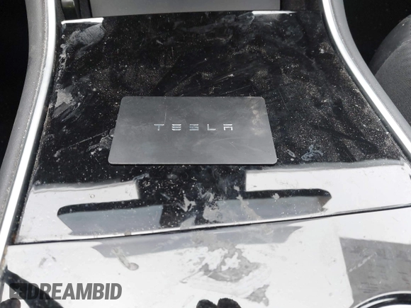 2018 Tesla Model 3 Long Range Battery with VIN 5YJ3E1EA6JF052659, listed as a IAAI auction lot 42093903 with 49,255 mi miles and . Bid and sale history available at DreamBid. Image 11.