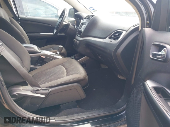 2014 Dodge Journey SE with VIN 3C4PDCABXET235827, listed as a IAAI auction lot 41927966 with 186,179 mi miles and . Bid and sale history available at carsss.com. Image 5.