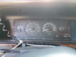 1998 Jeep Grand Cherokee Laredo with VIN 1J4GZ58S5WC295461, listed as a Copart auction lot 41787605 with 185,801 mi miles and Salvage Title. Bid and sale history available at carsss.com. Image 9.