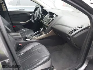 2012 Ford Focus SEL with VIN 1FAHP3H23CL348356, listed as a IAAI auction lot 42041001 with 174,510 mi miles. Bid and sale history available at carsss.com. Image 5.