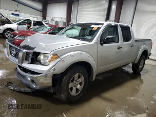 2010 Nissan Frontier SE with VIN 1N6AD0FV6AC406406, listed as a Copart auction lot 87168964 with 143,047 mi miles and Salvage title. Bid and sale history available at DreamBid. Image 1.