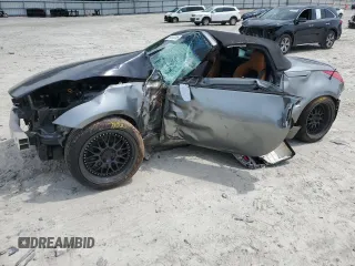 2004 Nissan 350Z Touring z VIN JN1AZ36A64M252493, wystawiony jako Copart lot #57613285 z przebiegiem Nie podano mil oraz Nie do naprawy • Non repairable. Historia ofert i sprzedaży dostępna na DreamBid. Obrazek 1.