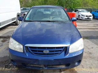 2006 Kia Spectra EX with VIN KNAFE122965293874, listed as a IAAI auction lot 42111219 with 241,644 mi miles. Bid and sale history available at carsss.com. Image 6.