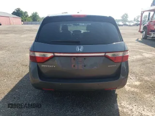 2012 Honda Odyssey Touring with VIN 5FNRL5H90CB505590, listed as a Copart auction lot 62566715 with 323,092 mi miles and Clean title. Bid and sale history available at DreamBid. Image 6.