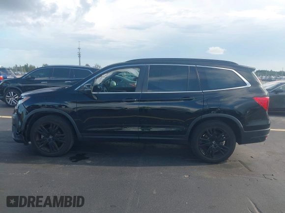 2022 Honda Pilot Special Edition with VIN 5FNYF5H25NB026414, listed as a IAAI auction lot 42590493 with 26,600 mi miles and . Bid and sale history available at DreamBid. Image 14.