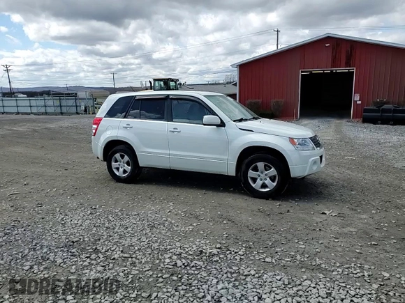 2012 Suzuki Grand Vitara Premium z VIN JS3TD0D66C4100845, wystawiony jako Copart lot #53454565 z przebiegiem 106 415 mil mil oraz Szkoda całkowita • Salvage title. Historia ofert i sprzedaży dostępna na DreamBid. Obrazek 14.