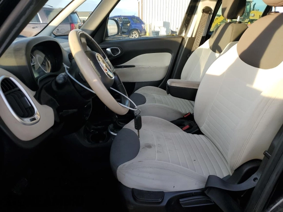 2014 FIAT 500L Easy with VIN ZFBCFABH1EZ001233, listed as a Copart auction lot 87961715 with 88,648 mi miles and Salvage Title. Bid and sale history available at DreamBid. Image 7.