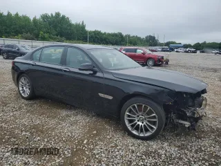 2014 BMW 7 Series ALPINA B7 z VIN WBAYE8C57ED136259, wystawiony jako Copart lot #55968735 z przebiegiem 93 828 mil mil oraz Czysty tytuł • Clean title. Historia ofert i sprzedaży dostępna na DreamBid. Obrazek 4.
