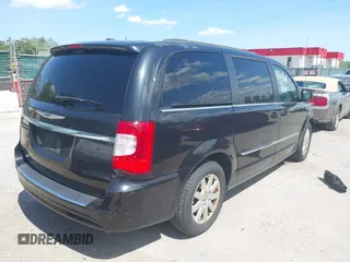 2016 Chrysler Town & Country Touring with VIN 2C4RC1BG2GR291874, listed as a IAAI auction lot 42167607 with 265,316 mi miles. Bid and sale history available at carsss.com. Image 4.