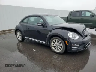 2017 Volkswagen Beetle SE with VIN 3VWJ17AT4HM630760, listed as a Copart auction lot 53664365 with 35,010 mi miles and Salvage Title. Bid and sale history available at DreamBid. Image 4.