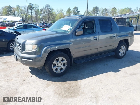 2007 Honda Ridgeline RTL z VIN 2HJYK16557H531198, wystawiony jako IAAI lot #41998612 z przebiegiem 194 975 mil mil oraz . Historia ofert i sprzedaży dostępna na DreamBid. Obrazek 2.