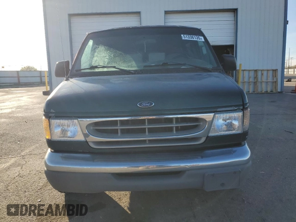 1999 Ford Econoline Passenger XL with VIN 1FMRE1126XHB41841, listed as a Copart auction lot 51338135 with 161,416 mi miles and Clean title. Bid and sale history available at DreamBid. Image 5.