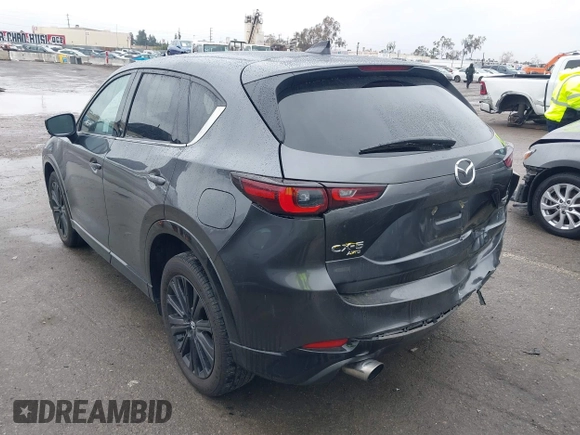 2022 Mazda CX-5 2.5 Turbo with VIN JM3KFBAY8N0647204, listed as a IAAI auction lot 41567490 with 40,396 mi miles and . Bid and sale history available at carsss.com. Image 3.