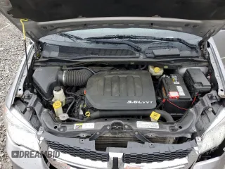 2014 Dodge Grand Caravan SXT z VIN 2C4RDGCG9ER179424, wystawiony jako Copart lot #58532245 z przebiegiem 193 409 mil mil oraz Szkoda całkowita • Salvage title. Historia ofert i sprzedaży dostępna na DreamBid. Obrazek 12.