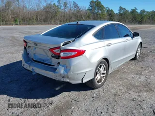 2014 Ford Fusion SE with VIN 3FA6P0H70ER126458, listed as a IAAI auction lot 41608408 with 230,311 mi miles. Bid and sale history available at carsss.com. Image 4.