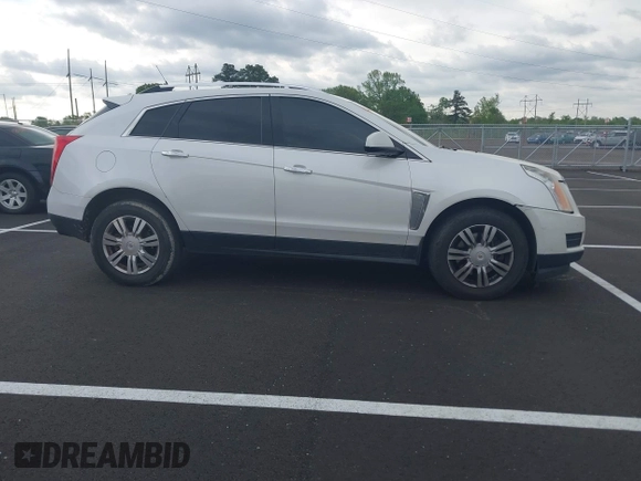 2014 Cadillac SRX Luxury Collection with VIN 3GYFNBE36ES519705, listed as a IAAI auction lot 42069288 with 211,632 mi miles and . Bid and sale history available at carsss.com. Image 13.