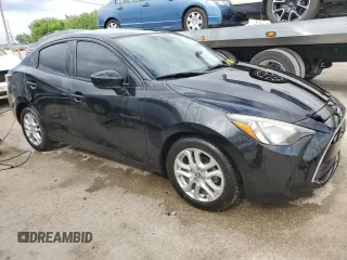 2016 Scion iA z VIN 3MYDLBZV3GY120380, wystawiony jako Copart lot #56506595 z przebiegiem 113 957 mil mil oraz Szkoda całkowita • Salvage title. Historia ofert i sprzedaży dostępna na DreamBid. Obrazek 4.