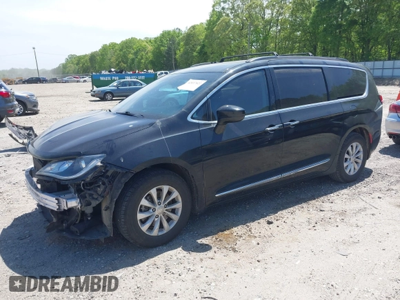 2017 Chrysler Pacifica Touring L with VIN 2C4RC1BG7HR539716, listed as a IAAI auction lot 42037822 with 160,623 mi miles and . Bid and sale history available at DreamBid. Image 18.